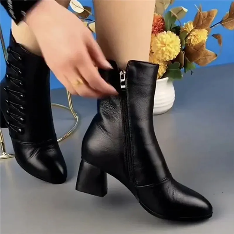 Leather ankle boots with side buttons for women